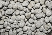 Metten Naturstein lose Kiesel Granit Grau-Weiß